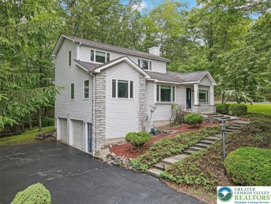 Located in the amenity-filled golf course community Country Club on Country Club of the Poconos Golf Course in Pennsylvania - for sale on GolfHomes.com, golf home, golf lot