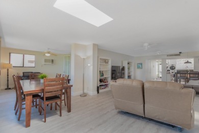 Uniquely reconfigured corner unit with 330 sq ft of additional on Fountains Golf and Country Club in Florida - for sale on GolfHomes.com, golf home, golf lot