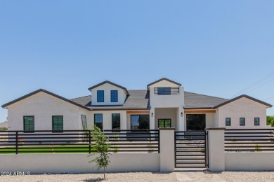 Experience luxury in this custom-built 7-bed, 6-bath estate on a on Seville Golf and Country Club in Arizona - for sale on GolfHomes.com, golf home, golf lot