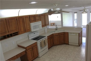 Welcome to this beautifully maintained 4-bedroom, 3-bath on  in Florida - for sale on GolfHomes.com, golf home, golf lot