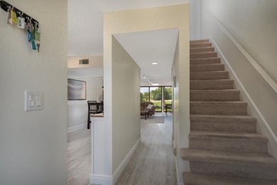 Uniquely reconfigured corner unit with 330 sq ft of additional on Fountains Golf and Country Club in Florida - for sale on GolfHomes.com, golf home, golf lot