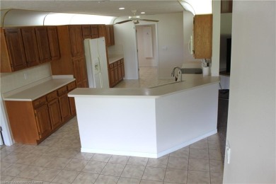 Welcome to this beautifully maintained 4-bedroom, 3-bath on  in Florida - for sale on GolfHomes.com, golf home, golf lot
