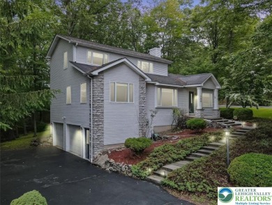 Located in the amenity-filled golf course community Country Club on Country Club of the Poconos Golf Course in Pennsylvania - for sale on GolfHomes.com, golf home, golf lot