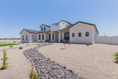 Experience luxury in this custom-built 7-bed, 6-bath estate on a on Seville Golf and Country Club in Arizona - for sale on GolfHomes.com, golf home, golf lot