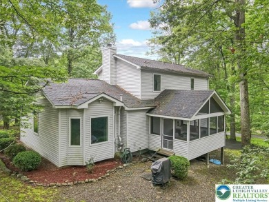 Located in the amenity-filled golf course community Country Club on Country Club of the Poconos Golf Course in Pennsylvania - for sale on GolfHomes.com, golf home, golf lot