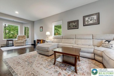 Located in the amenity-filled golf course community Country Club on Country Club of the Poconos Golf Course in Pennsylvania - for sale on GolfHomes.com, golf home, golf lot