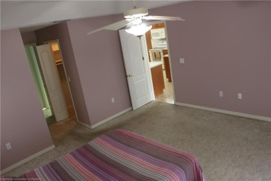 Welcome to this beautifully maintained 4-bedroom, 3-bath on  in Florida - for sale on GolfHomes.com, golf home, golf lot