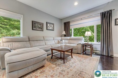 Located in the amenity-filled golf course community Country Club on Country Club of the Poconos Golf Course in Pennsylvania - for sale on GolfHomes.com, golf home, golf lot