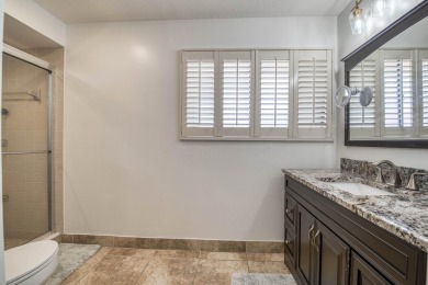 Discover comfort and charm in this well-maintained, light-filled on PGA National Golf Club in Florida - for sale on GolfHomes.com, golf home, golf lot