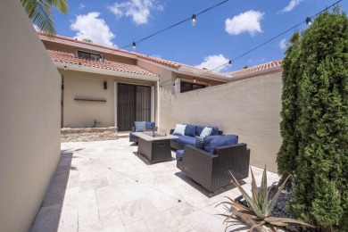 Discover comfort and charm in this well-maintained, light-filled on PGA National Golf Club in Florida - for sale on GolfHomes.com, golf home, golf lot