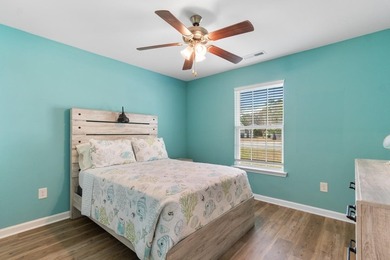 Welcome home to this beautifully maintained 5-bedroom, 3 full on Heron Point Golf Club in South Carolina - for sale on GolfHomes.com, golf home, golf lot