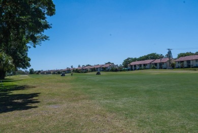 Uniquely reconfigured corner unit with 330 sq ft of additional on Fountains Golf and Country Club in Florida - for sale on GolfHomes.com, golf home, golf lot