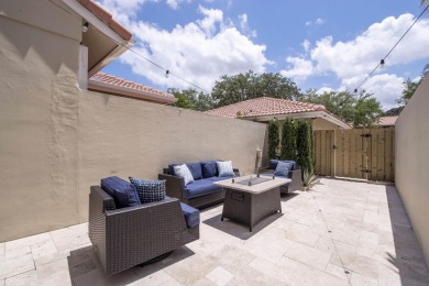 Discover comfort and charm in this well-maintained, light-filled on PGA National Golf Club in Florida - for sale on GolfHomes.com, golf home, golf lot