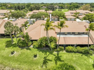 Discover comfort and charm in this well-maintained, light-filled on PGA National Golf Club in Florida - for sale on GolfHomes.com, golf home, golf lot