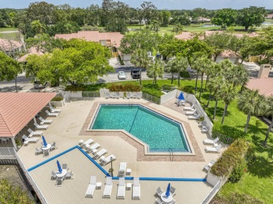 Discover comfort and charm in this well-maintained, light-filled on PGA National Golf Club in Florida - for sale on GolfHomes.com, golf home, golf lot