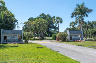 Uniquely reconfigured corner unit with 330 sq ft of additional on Fountains Golf and Country Club in Florida - for sale on GolfHomes.com, golf home, golf lot