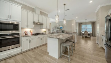 Formerly a model home, this exquisite residence showcases on Ritz-Carlton Members Golf Club in Florida - for sale on GolfHomes.com, golf home, golf lot