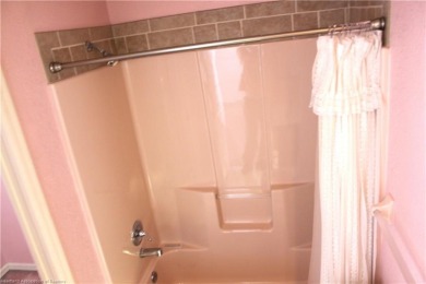 Welcome to this beautifully maintained 4-bedroom, 3-bath on  in Florida - for sale on GolfHomes.com, golf home, golf lot