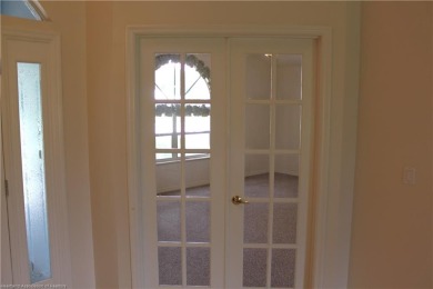 Welcome to this beautifully maintained 4-bedroom, 3-bath on  in Florida - for sale on GolfHomes.com, golf home, golf lot
