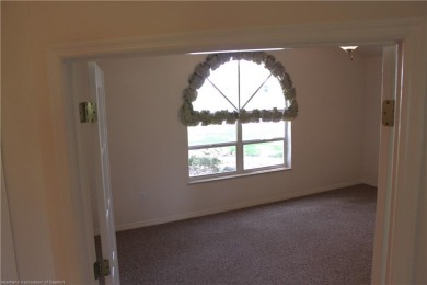 Welcome to this beautifully maintained 4-bedroom, 3-bath on  in Florida - for sale on GolfHomes.com, golf home, golf lot