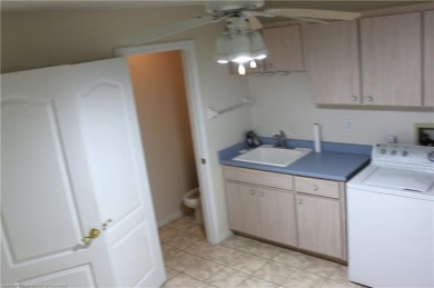Welcome to this beautifully maintained 4-bedroom, 3-bath on  in Florida - for sale on GolfHomes.com, golf home, golf lot
