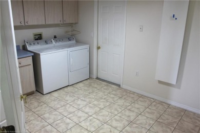 Welcome to this beautifully maintained 4-bedroom, 3-bath on  in Florida - for sale on GolfHomes.com, golf home, golf lot