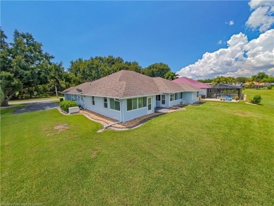 Welcome to this beautifully maintained 4-bedroom, 3-bath on Spring Lake Golf Resort in Florida - for sale on GolfHomes.com, golf home, golf lot