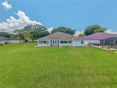 Welcome to this beautifully maintained 4-bedroom, 3-bath on Spring Lake Golf Resort in Florida - for sale on GolfHomes.com, golf home, golf lot