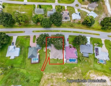 Welcome to this beautifully maintained 4-bedroom, 3-bath on Spring Lake Golf Resort in Florida - for sale on GolfHomes.com, golf home, golf lot