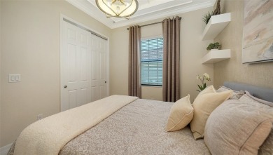 Formerly a model home, this exquisite residence showcases on Ritz-Carlton Members Golf Club in Florida - for sale on GolfHomes.com, golf home, golf lot