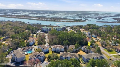 Embrace the essence of coastal living in this beautifully on Oyster Bay Golf Links in North Carolina - for sale on GolfHomes.com, golf home, golf lot