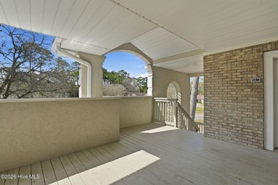 Embrace the essence of coastal living in this beautifully on Oyster Bay Golf Links in North Carolina - for sale on GolfHomes.com, golf home, golf lot