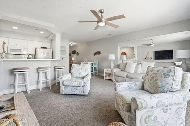 Embrace the essence of coastal living in this beautifully on Oyster Bay Golf Links in North Carolina - for sale on GolfHomes.com, golf home, golf lot