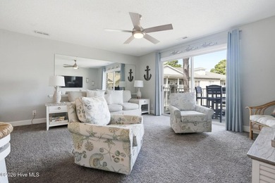 Embrace the essence of coastal living in this beautifully on Oyster Bay Golf Links in North Carolina - for sale on GolfHomes.com, golf home, golf lot