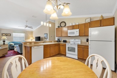 BARELY LIVED IN 2/2 *Colony* Patio Villa TURNKEY in the VILLAGE on Truman Executive Golf Course in Florida - for sale on GolfHomes.com, golf home, golf lot