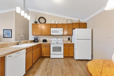 BARELY LIVED IN 2/2 *Colony* Patio Villa TURNKEY in the VILLAGE on Truman Executive Golf Course in Florida - for sale on GolfHomes.com, golf home, golf lot