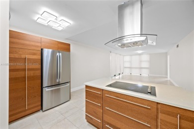 Step into this beautifully remodeled corner unit, where modern on Turnberry Isle Resort and Club in Florida - for sale on GolfHomes.com, golf home, golf lot