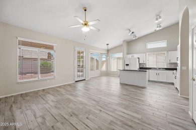 This beautifully updated home offers a spacious layout with a on Palm Valley Golf Club  in Arizona - for sale on GolfHomes.com, golf home, golf lot