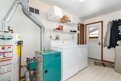 This well-maintained 3 bedroom 2 bath house sits on a double lot on Sugar Springs Country Club in Michigan - for sale on GolfHomes.com, golf home, golf lot