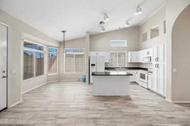 This beautifully updated home offers a spacious layout with a on Palm Valley Golf Club  in Arizona - for sale on GolfHomes.com, golf home, golf lot