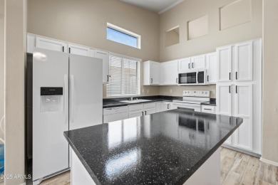 This beautifully updated home offers a spacious layout with a on Palm Valley Golf Club  in Arizona - for sale on GolfHomes.com, golf home, golf lot