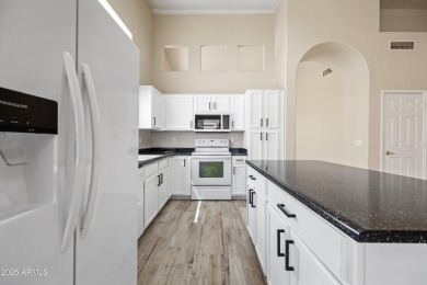 This beautifully updated home offers a spacious layout with a on Palm Valley Golf Club  in Arizona - for sale on GolfHomes.com, golf home, golf lot