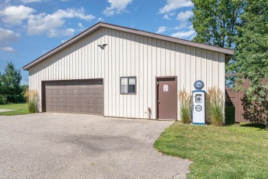 This well-maintained 3 bedroom 2 bath house sits on a double lot on Sugar Springs Country Club in Michigan - for sale on GolfHomes.com, golf home, golf lot
