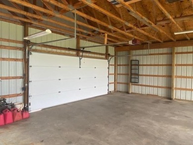 This well-maintained 3 bedroom 2 bath house sits on a double lot on Sugar Springs Country Club in Michigan - for sale on GolfHomes.com, golf home, golf lot