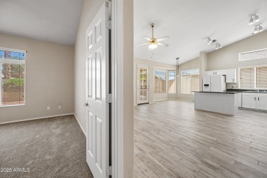 This beautifully updated home offers a spacious layout with a on Palm Valley Golf Club  in Arizona - for sale on GolfHomes.com, golf home, golf lot