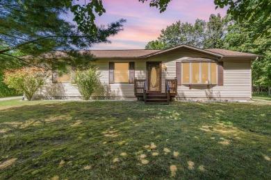 This well-maintained 3 bedroom 2 bath house sits on a double lot on Sugar Springs Country Club in Michigan - for sale on GolfHomes.com, golf home, golf lot