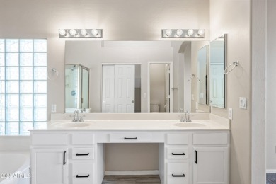 This beautifully updated home offers a spacious layout with a on Palm Valley Golf Club  in Arizona - for sale on GolfHomes.com, golf home, golf lot