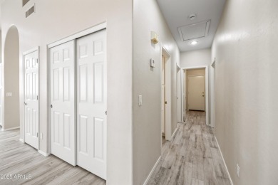 This beautifully updated home offers a spacious layout with a on Palm Valley Golf Club  in Arizona - for sale on GolfHomes.com, golf home, golf lot