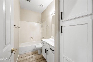 This beautifully updated home offers a spacious layout with a on Palm Valley Golf Club  in Arizona - for sale on GolfHomes.com, golf home, golf lot