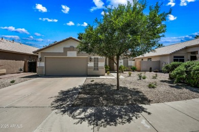 This beautifully updated home offers a spacious layout with a on Palm Valley Golf Club  in Arizona - for sale on GolfHomes.com, golf home, golf lot